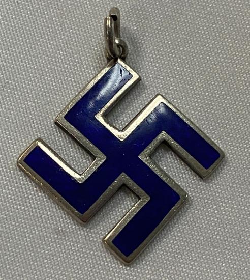 British Silver Swastika with 1910 hallmark  